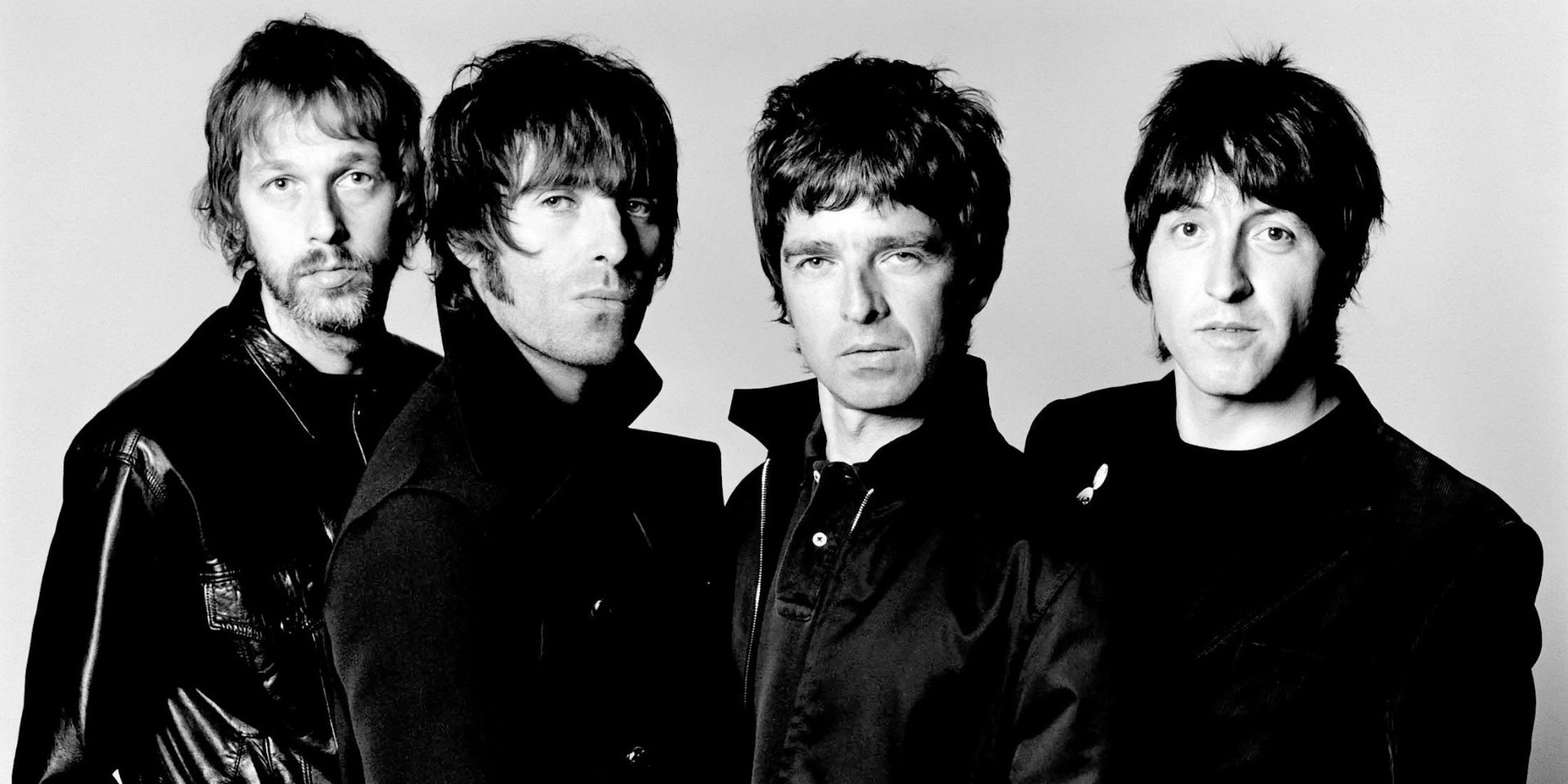 Oasis shares new lyric video for 'Fade Away' in commemoration of debut album's 25th anniversary – watch