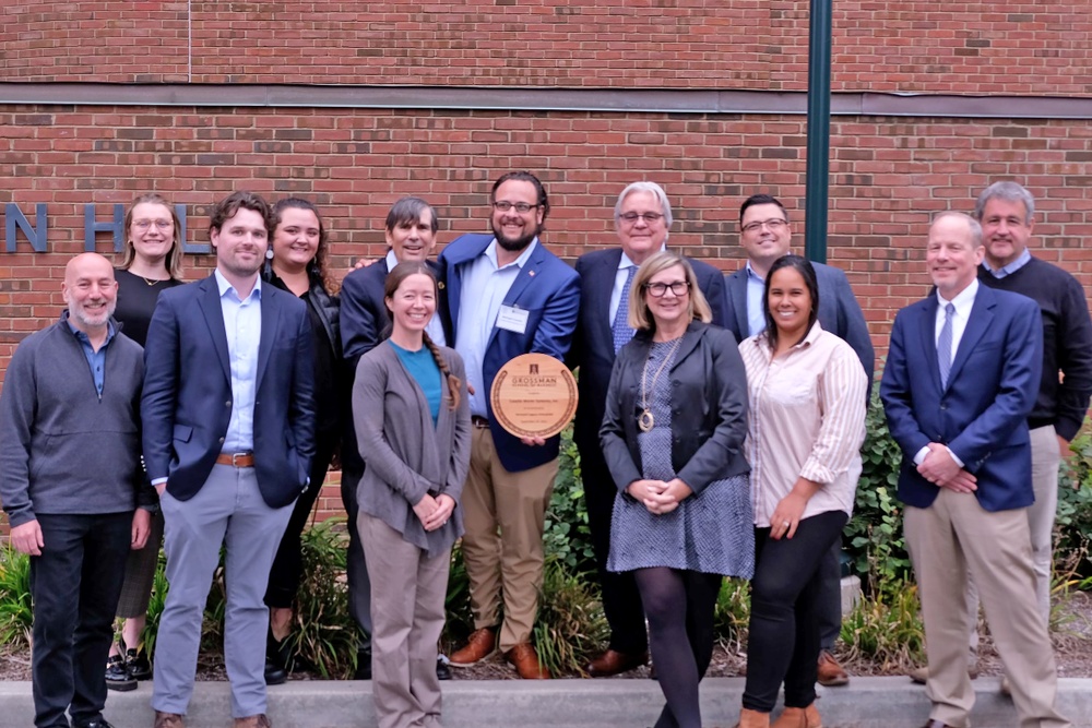 Members of Casella Waste Systems, Inc. pose with award