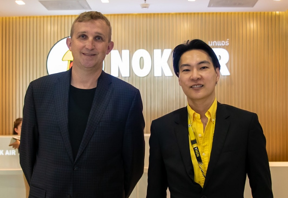 Meeting at Nok Air head office in Bangkok, Thailand. John Boguslawski, Co-Founder & Head of Business Development at TripStack and Dr. Wutthiphum Jurankool, Nok Air CEO. 
