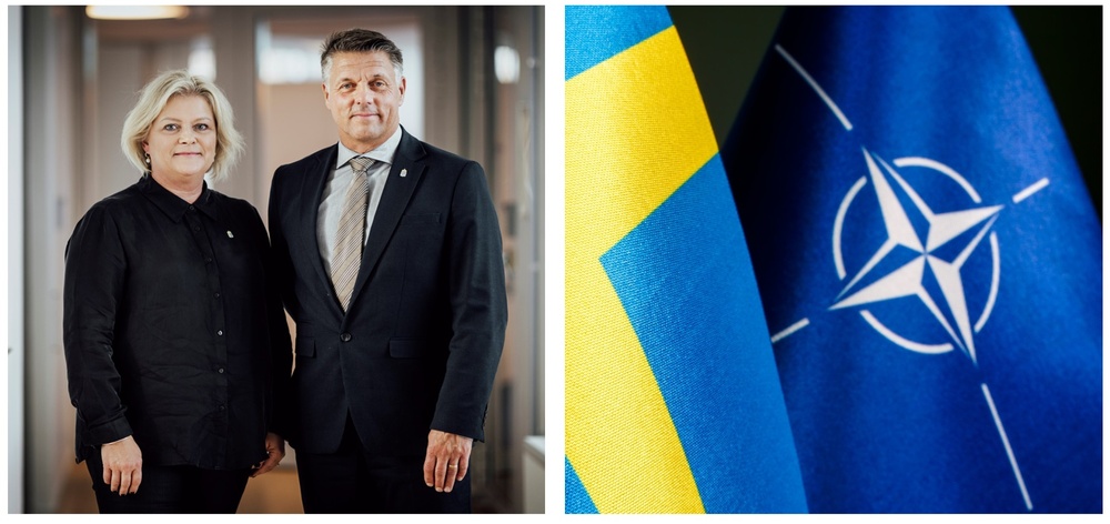 Landshövding Ulrica Messing, försvarsdirektör Peter Ryman, svenska flaggan och Natoflaggan.