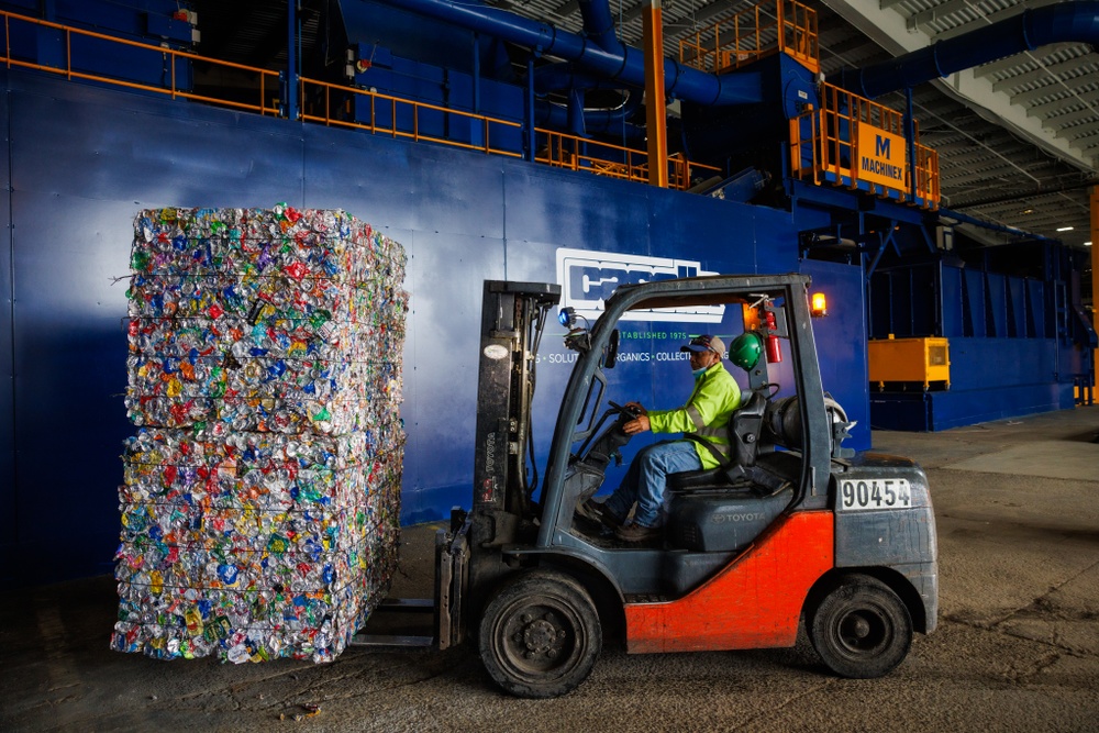 A Casella forklift operator places baled material at the recently renovated Material Recovery Facility in Charlestown, Mass.