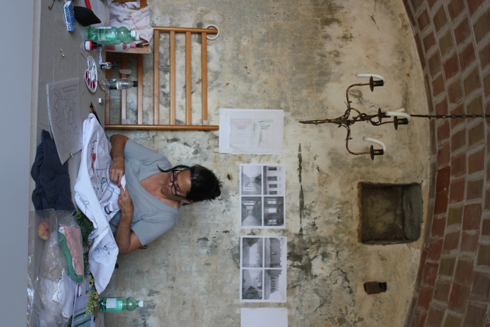 Barbados based artist Annalee Davis working with emboridery for Pray to Flowers – A Plot of Disalienation, work in progress, Annalee Davis 2022. Courtesy of the artists and Focus Foundation, Girona, Spain.