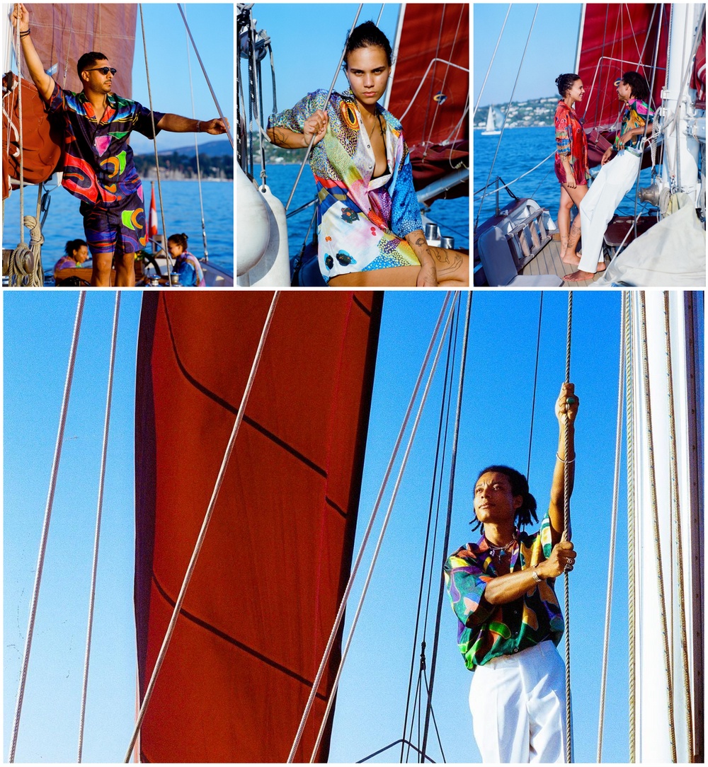 Young people on a sailing boat wearing short sleeved silk shirts by designer Ricardo Bernardino inspired by colorful, Modernist paintings by Michel Deville with motifs from the underwater world.
