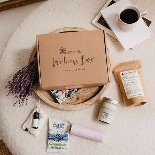 A closed Nature's Wellness subscription box with non-toxic, natural, vegan skin-care, and household products.