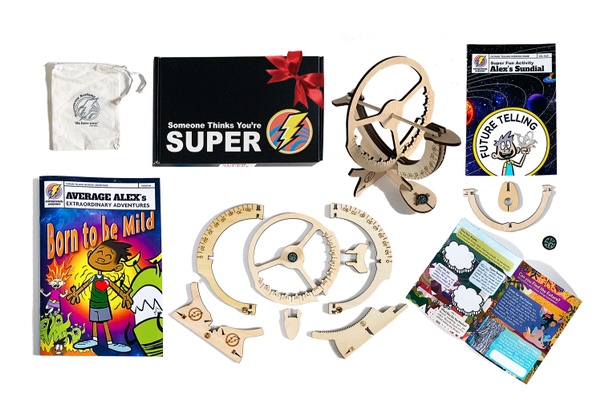 Items from a Superpower Academy subscription box, including parts and instructions to make STEM tools.