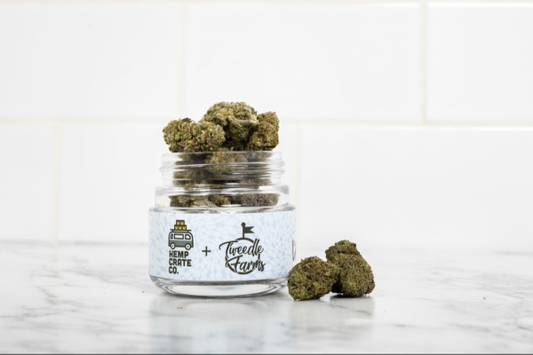 A jar full of weed buds from the Hemp Crate Co. subscription box.