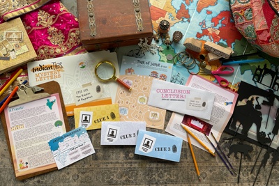 IndianTies Mystery Letters for kids monthly subscription box - showcasing Jaipur with shadow puppets for this box.