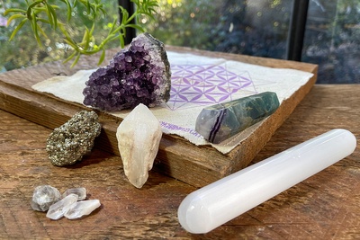 Example 2 of Enchanted Crystal Variety Box, crystal subscription box, 6 different crystal selections, and 1 purple colored display cloth