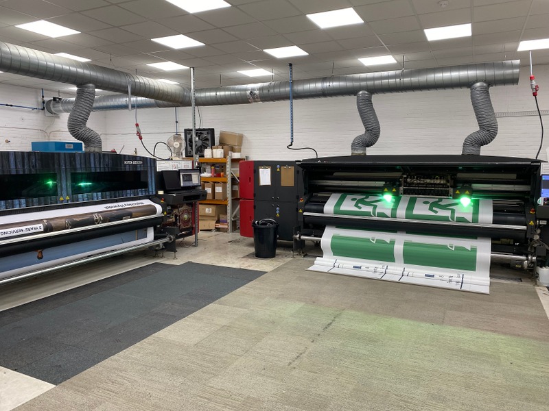 Our two VUTEk GS3250r 3.2m-wide printers