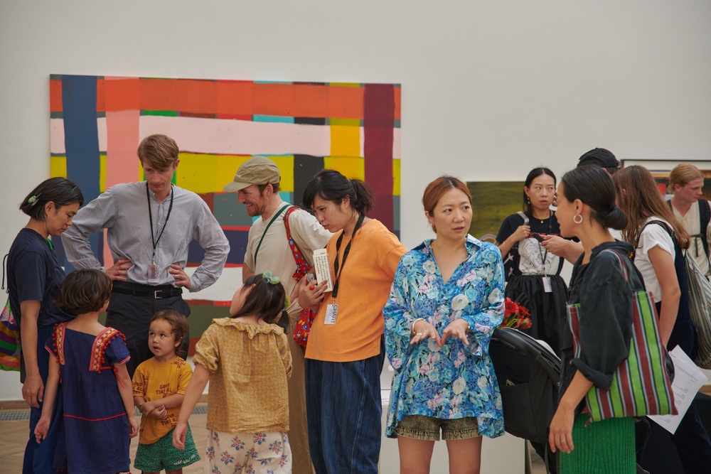 Visitors at an exhibition of contemporary art in the historic Charlottenborg Palace during CHART 2022 in Copenhagen.