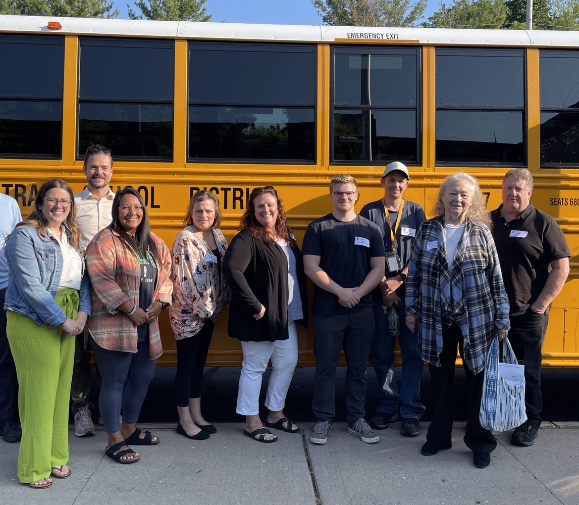 New staff members pose for photo at orientation