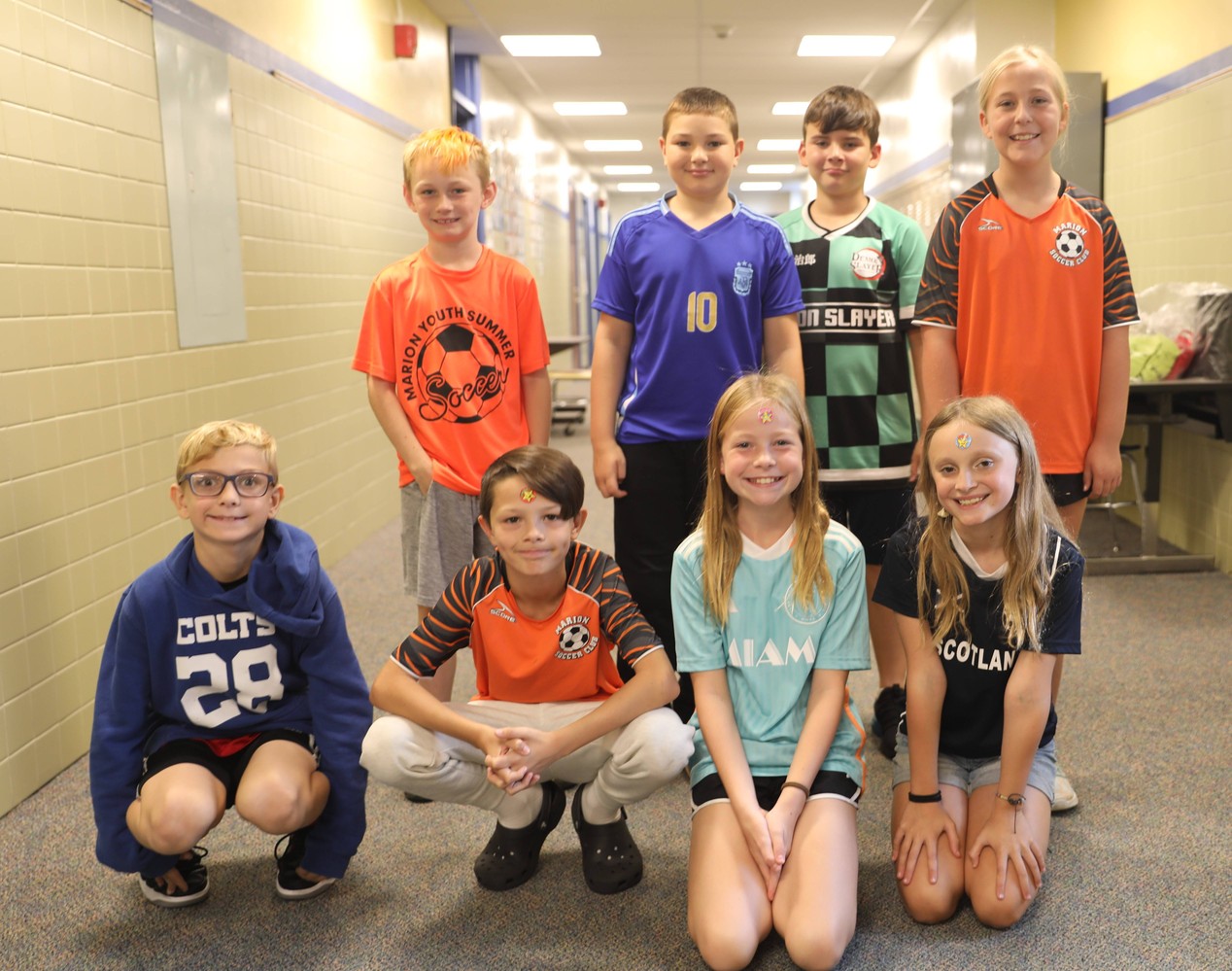 Students wearing sports jerseys 