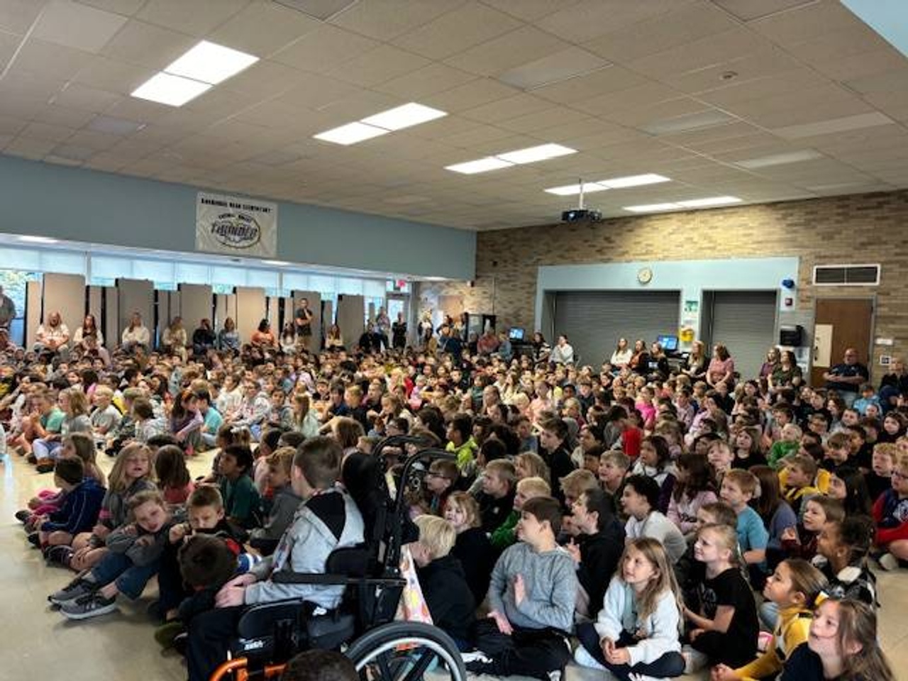 Student's sitting at the assembly