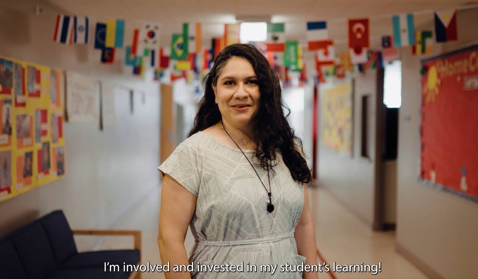 parent standing in hallway of a school