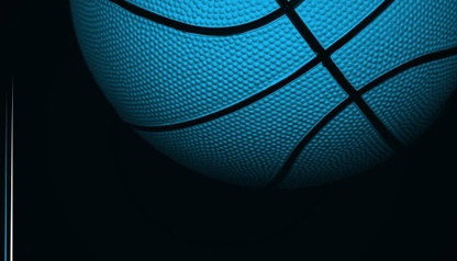 blue basketball on black ground