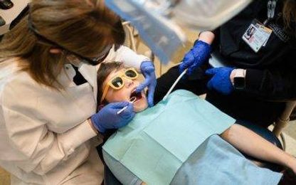 kid getting dental care