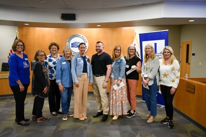 Image of recipients at the Assistance League Reception.