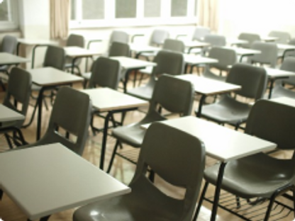 A room full of empty desks