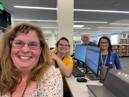 library staff happy