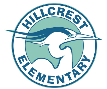 A sign welcoming visitors to Hillcrest Elementary School. The sign is located in front of the school building and features the school's name, logo (a heron), and the designation of "National Green Ribbon School." The sign is surrounded by trees and a grassy area.