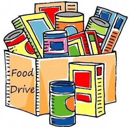 A box filled with canned goods and boxed food for a food drive.