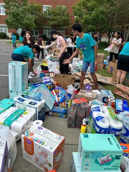 Cox Mill High School students gathering supplies for victims of Hurricane Helene.