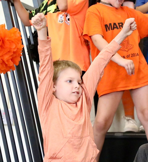 Students at a pep assembly