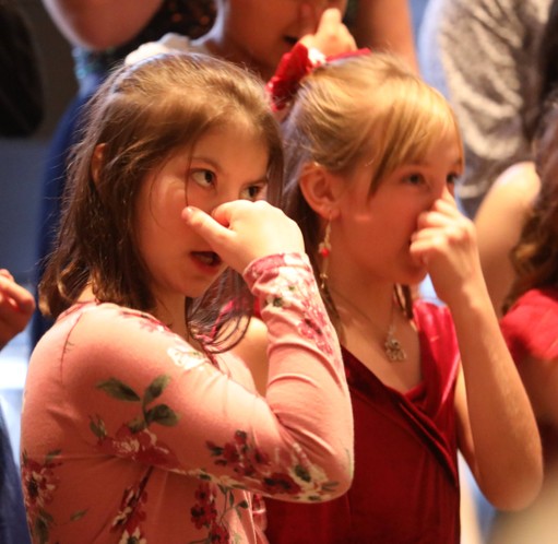 Members of the Fifth and Sixth Grade Chorus perform.