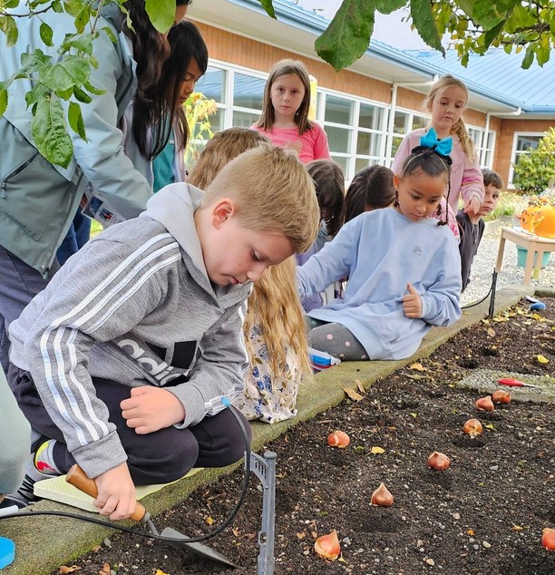 children working in a garden