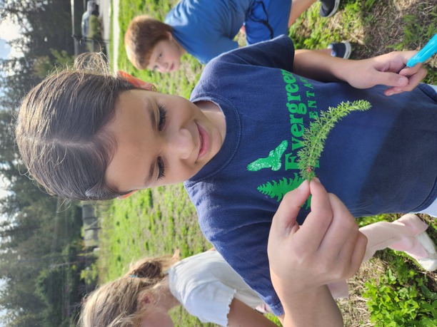 Student at Evergreen's Eagle Quest Learns Outside