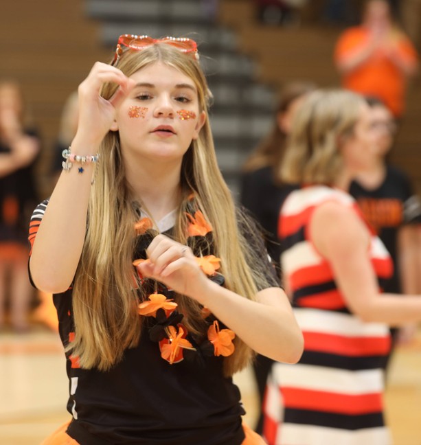 Students use ASL to sign the national anthem