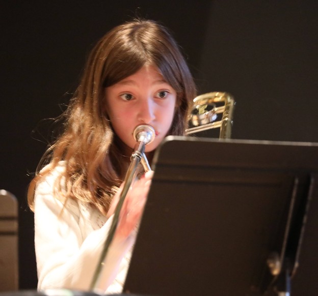 A member of the Beginner Band performs.