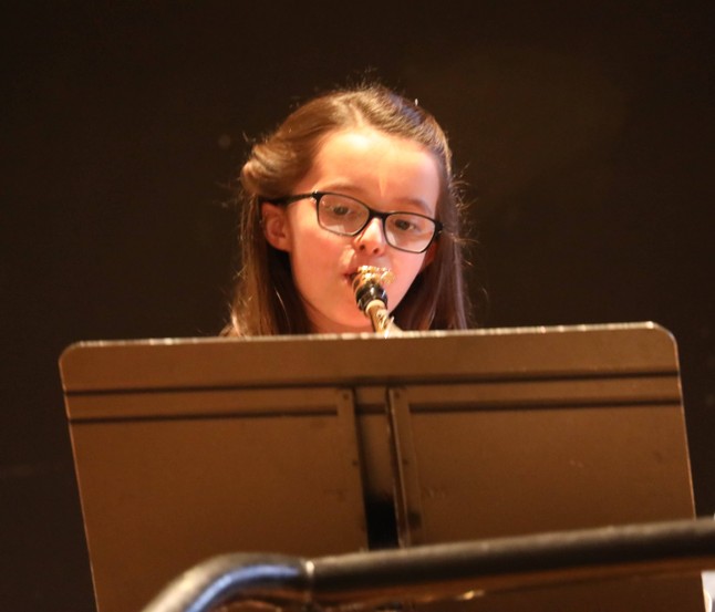 A member of the Beginner Band performs.