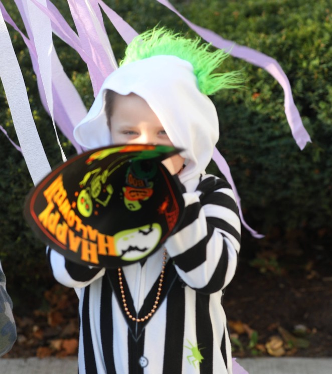 A student in the K-2 costume parade