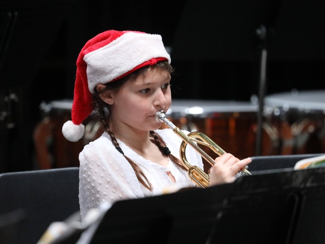 A member of the Beginner Band performs.