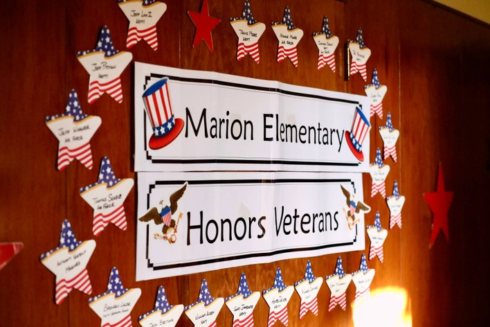 A display welcomes veterans to Marion  Elementary School.