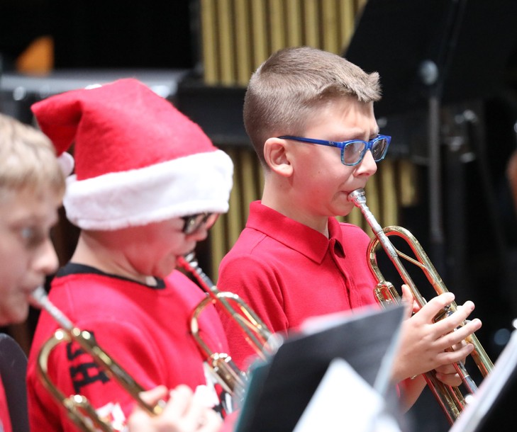 Members of the Fifth and Sixth Grade Band perform.