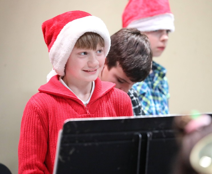 A member of the Fifth and Sixth Grade Band performs.