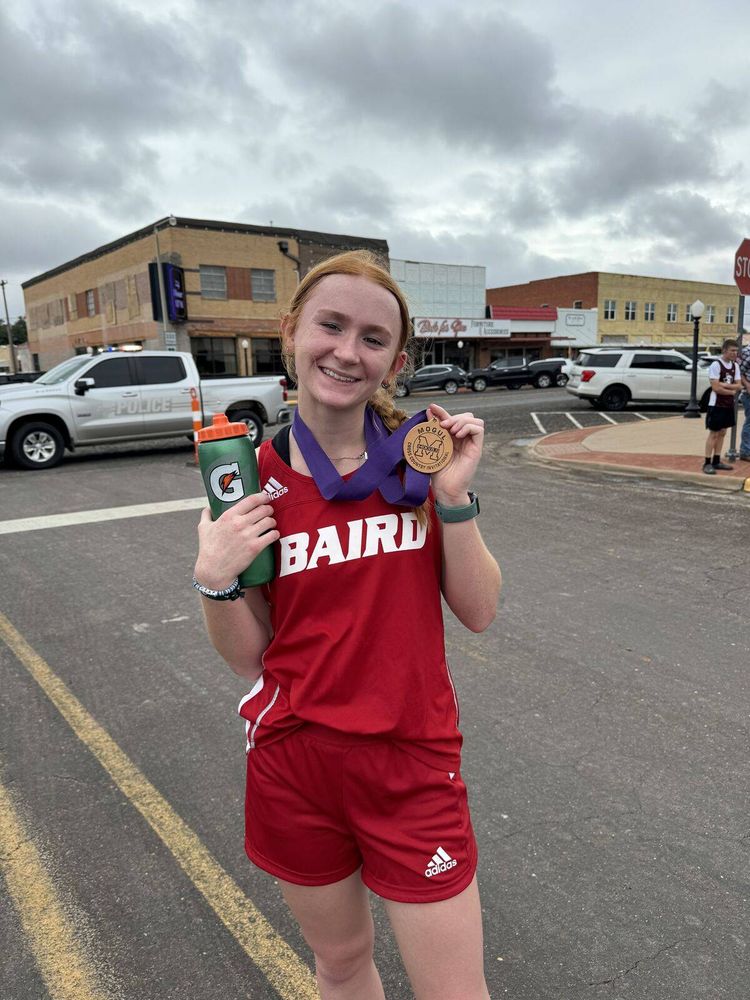 Madison Self with her medal