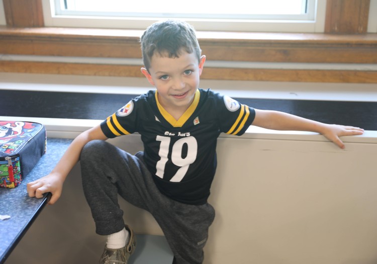 A student in a Pittsburgh Steelers jersey