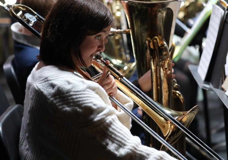 A member of the Fifth and Sixth Grade Band performs.