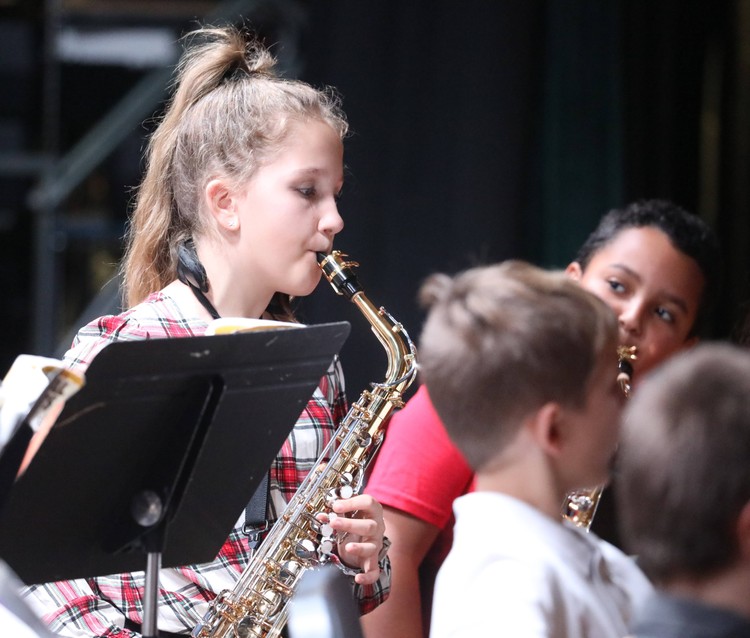 A member of the Beginner Band performs.