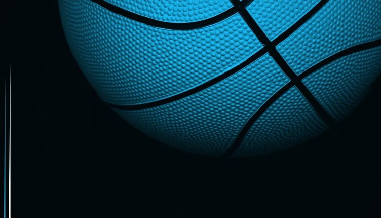 blue basketball on a black background