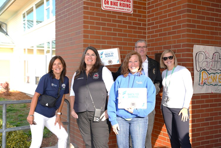 superintendent michelle kuss-cybula with volunteer greeters