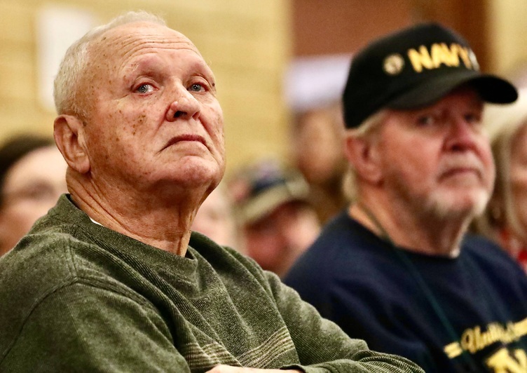 Veterans sit at the assembly