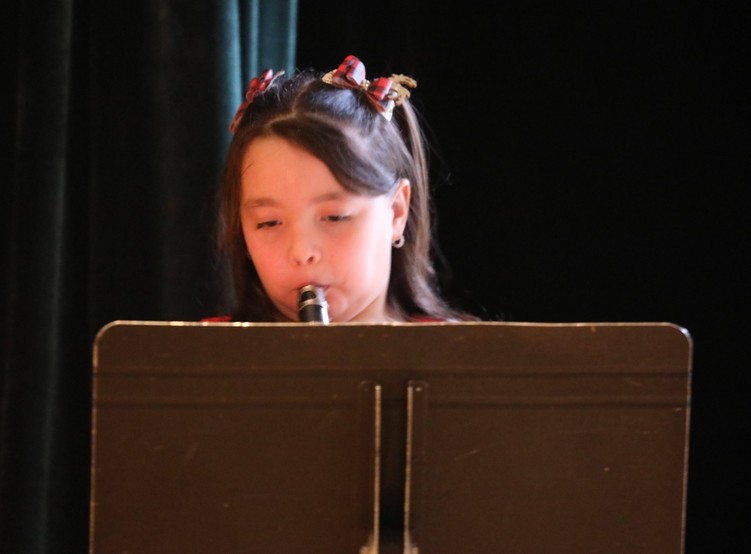 A member of the Beginner Band performs.