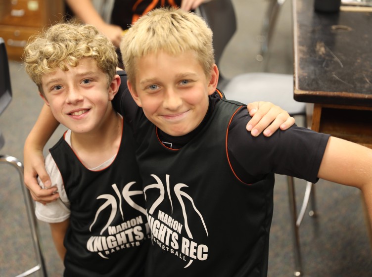 Students wearing sports jerseys 