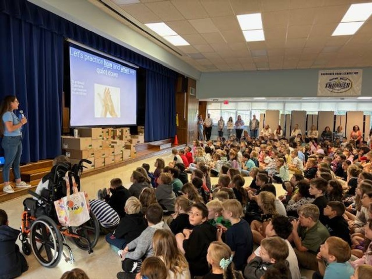 Student's sitting at the assembly