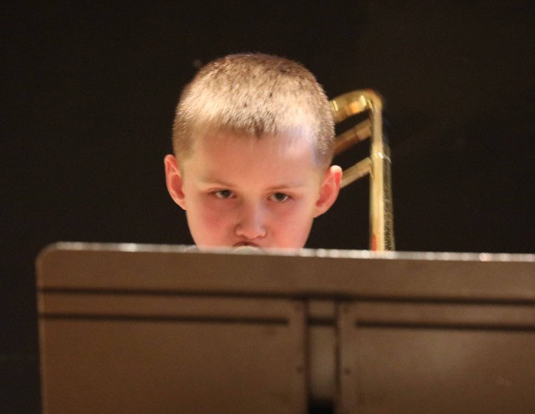 A member of the Beginner Band performs.