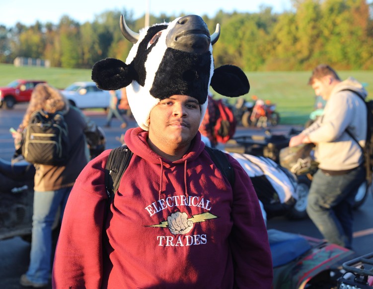 A student wore a cow costume as part of Country Living Day